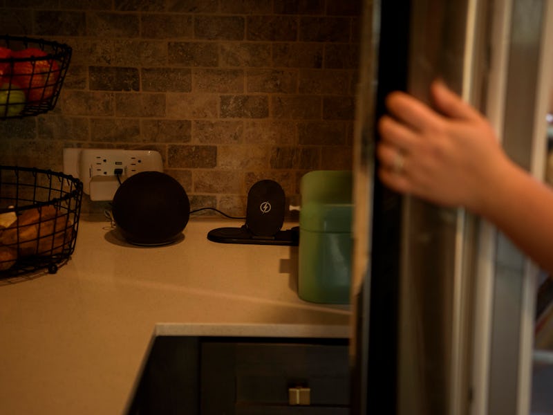 PEARLAND, TEXAS - DECEMBER 17: An Amazon Alexa sits next to the refrigerator at the home of Mary Ves...