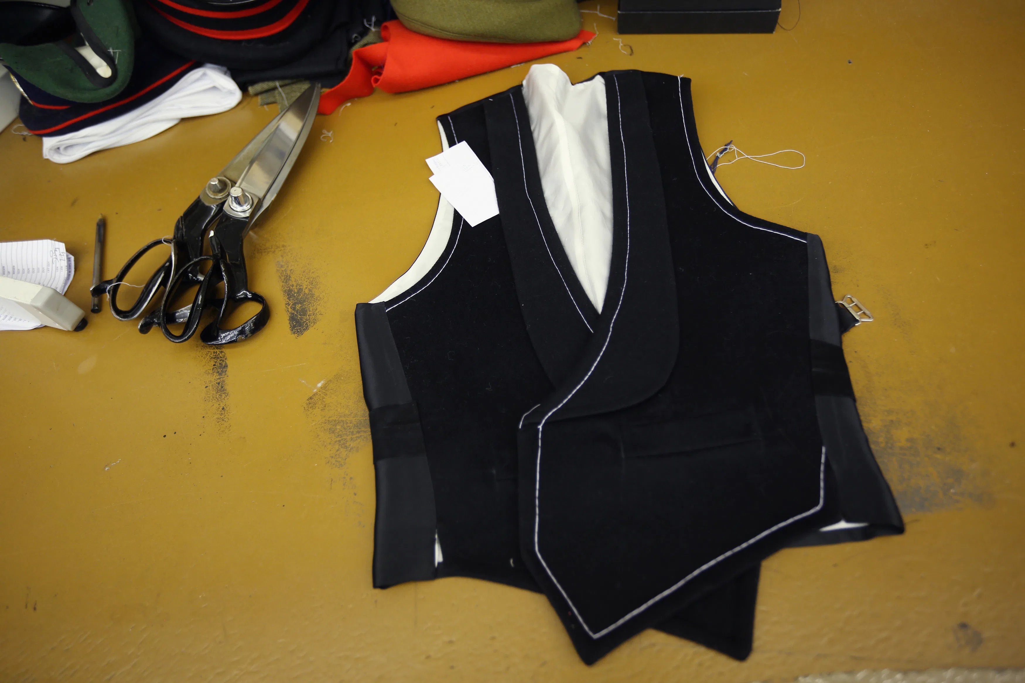 ST ALBANS, ENGLAND - SEPTEMBER 24: A partially-finished formal wear jacket in G.D. Golding tailors, ...