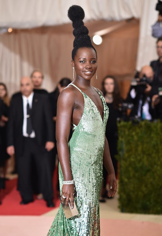 Lupita Nyongo tall hair poufs Met gala 2021