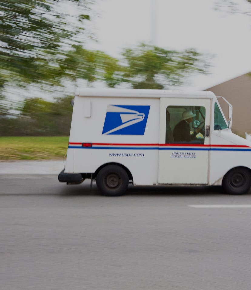 Miami, USA - January 18, 2013: United States Post Office mail truck (USPS) speeding in Miami, Florid...