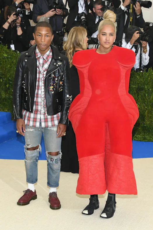 NEW YORK, NY - MAY 01: Pharrell Williams and Helen Lasichanh attends the "Rei Kawakubo/Comme des Gar...