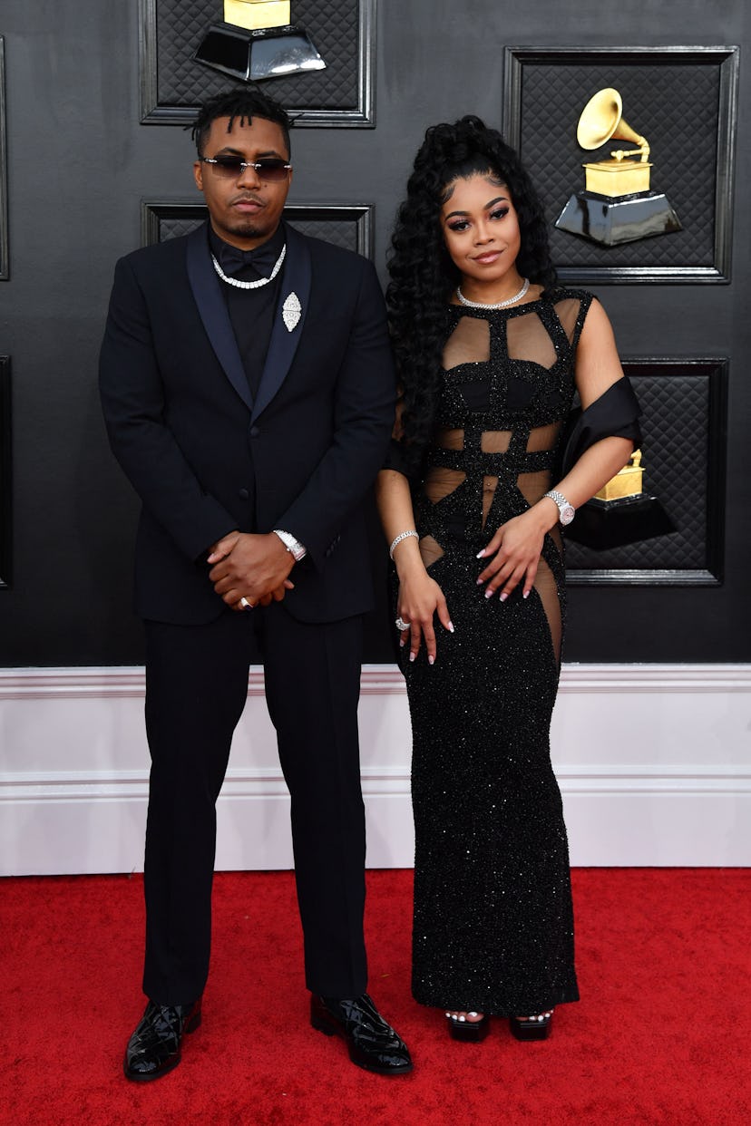 US rapper Nas (L) and Destiny arrive for the 64th Annual Grammy Awards at the MGM Grand Garden Arena...