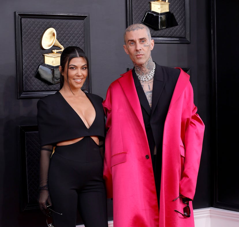 LAS VEGAS, NEVADA - APRIL 03: (L-R) Kourtney Kardashian and Travis Barker attend the 64th Annual GRA...