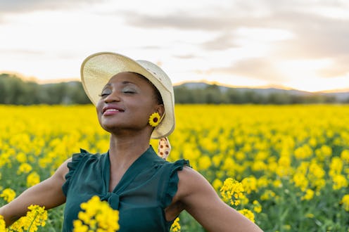 Portrait of attractive woman joy the beauty of nature.Freedom concept with copy space