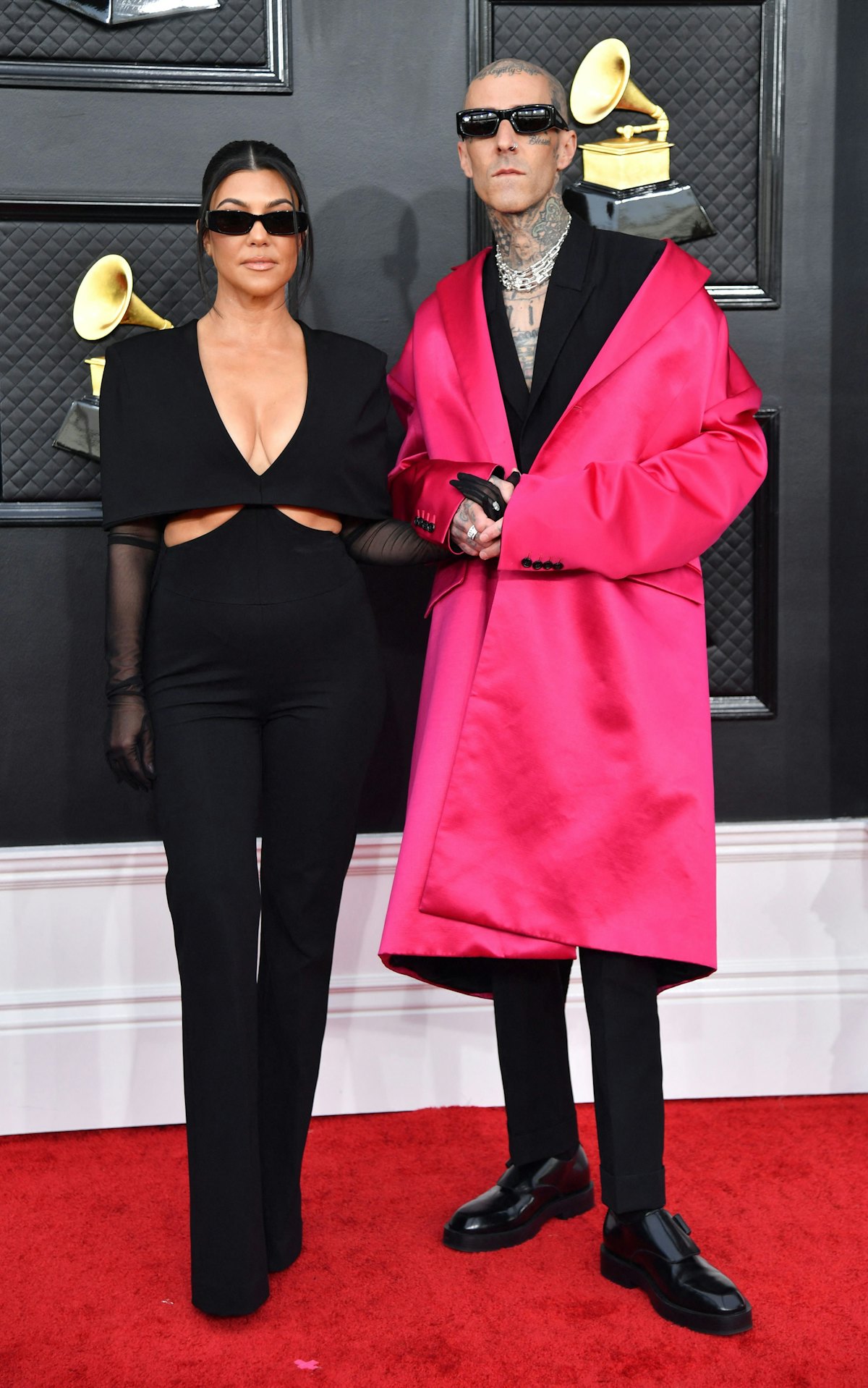 Kourtney Kardashian and musician Travis Barker arrive for the 64th Annual Grammy Awards at the MGM G...