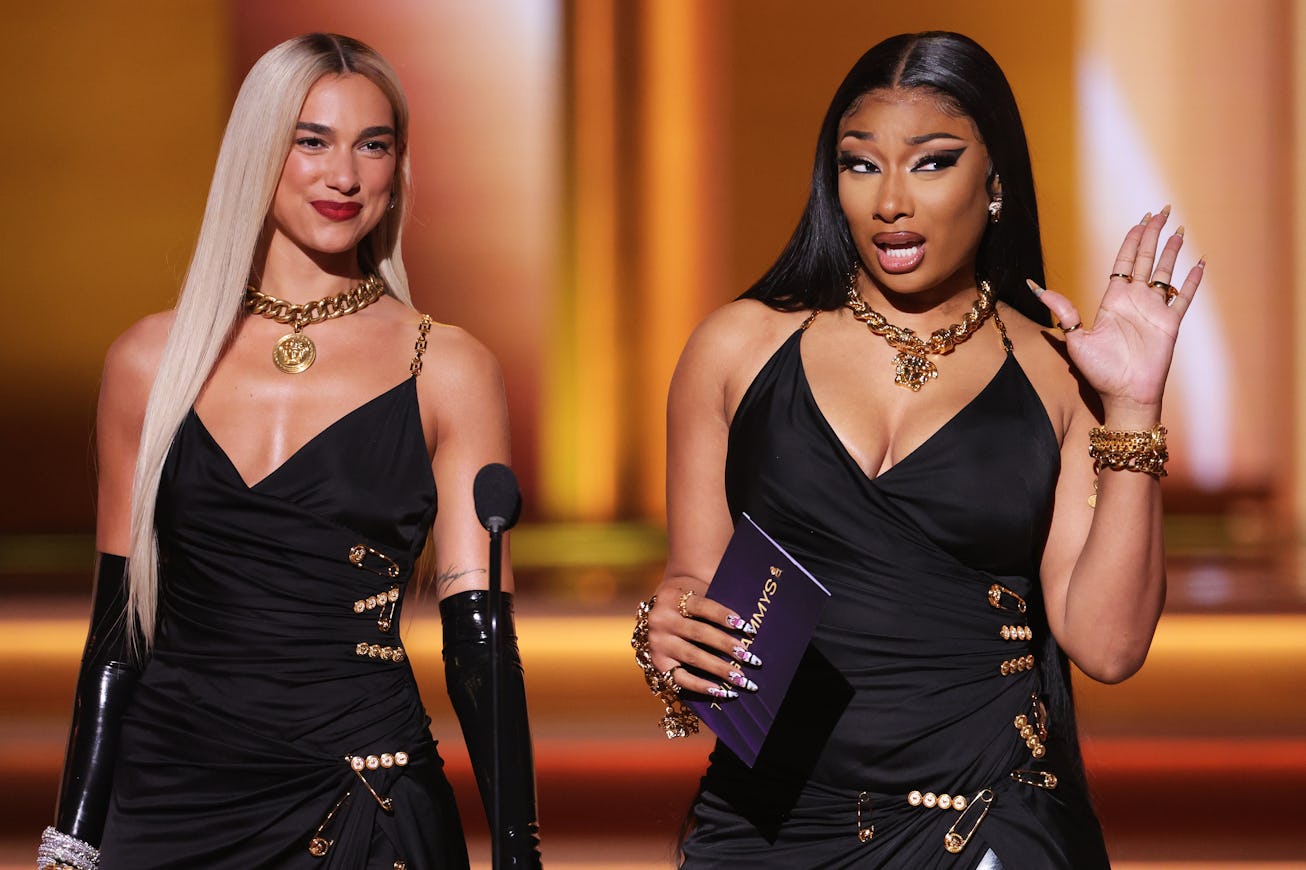 LAS VEGAS, NEVADA - APRIL 03: (L-R) Dua Lipa and Megan Thee Stallion speak onstage during the 64th A...
