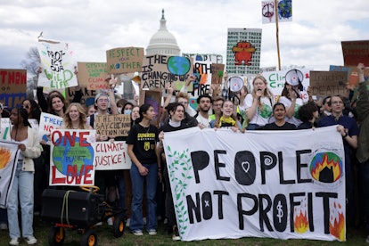 Environmental activists rally on Capitol Hill after a march from Lafayette Square during a Fridays G...