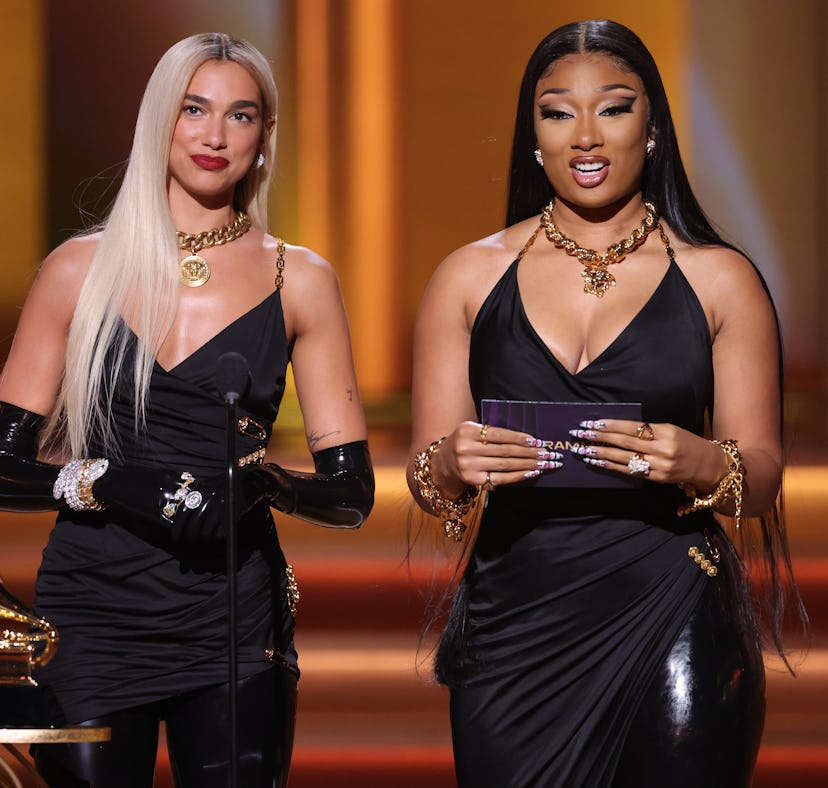 LAS VEGAS, NEVADA - APRIL 03: (L-R) Dua Lipa and Megan Thee Stallion speak onstage during the 64th A...