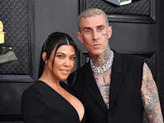 Kourtney Kardashian and Travis Barker's body language at the 2022 Grammys was hot and heavy — duh.