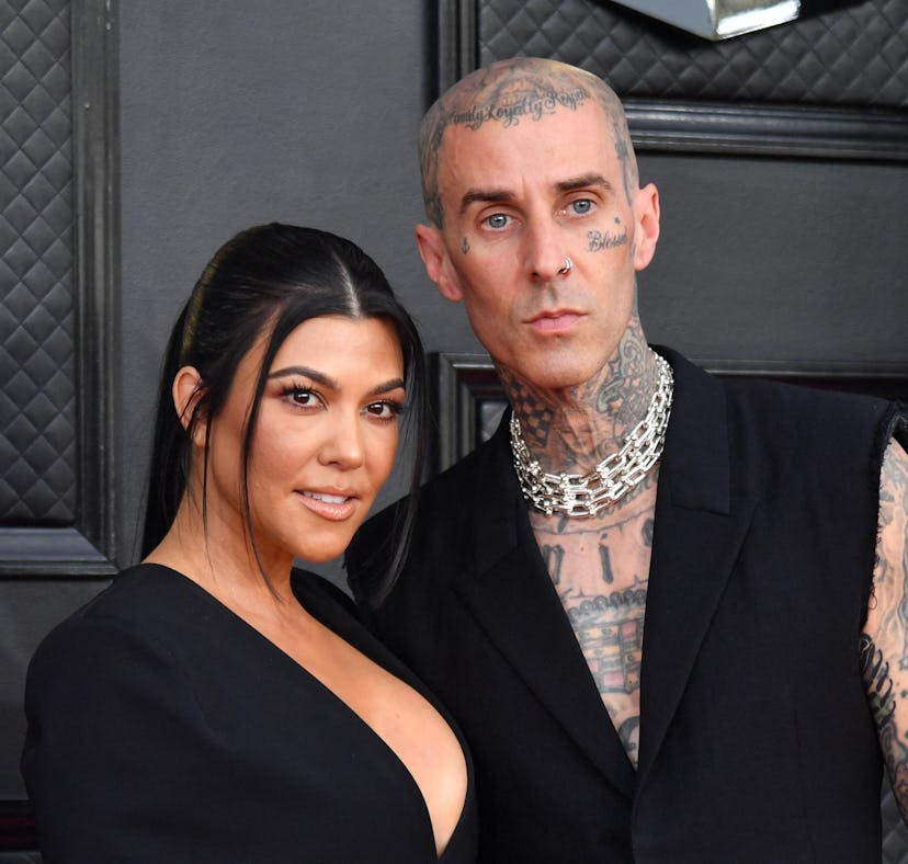 Kourtney Kardashian and Travis Barker's body language at the 2022 Grammys was hot and heavy — duh.