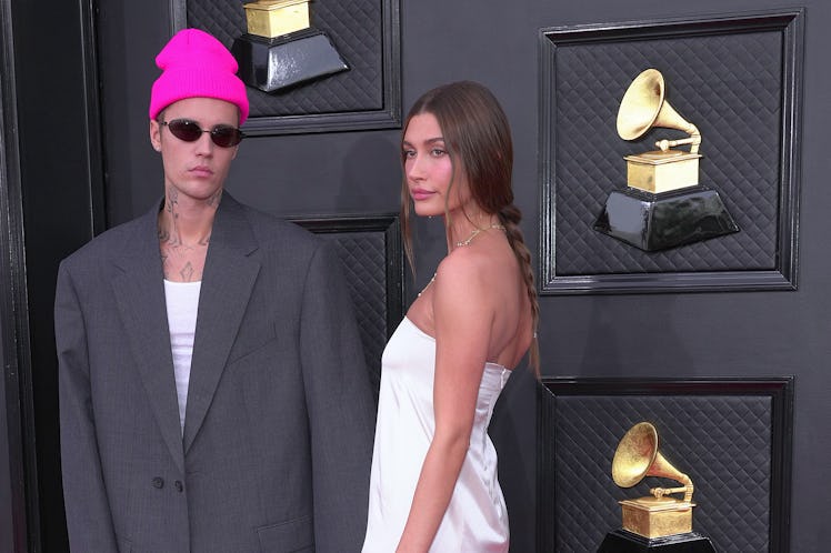 LAS VEGAS, NEVADA - APRIL 03: (L-R) Justin Bieber and Hailey Bieber attend the 64th Annual GRAMMY Aw...