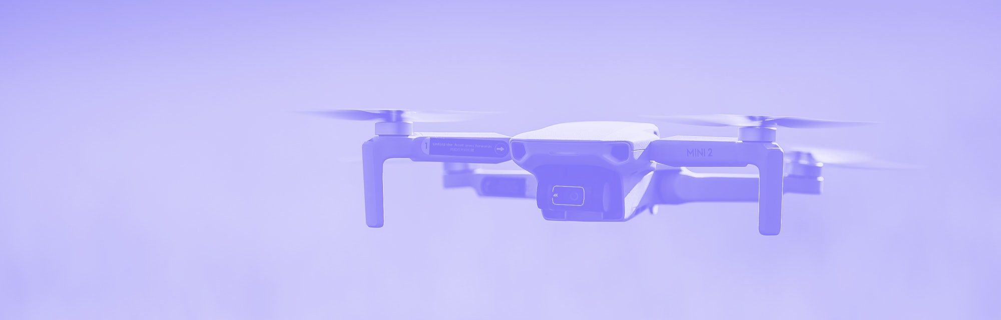Mavic mini 2 flying over green background. "Mavic mini 2 was launched on November 2020 and is the su...
