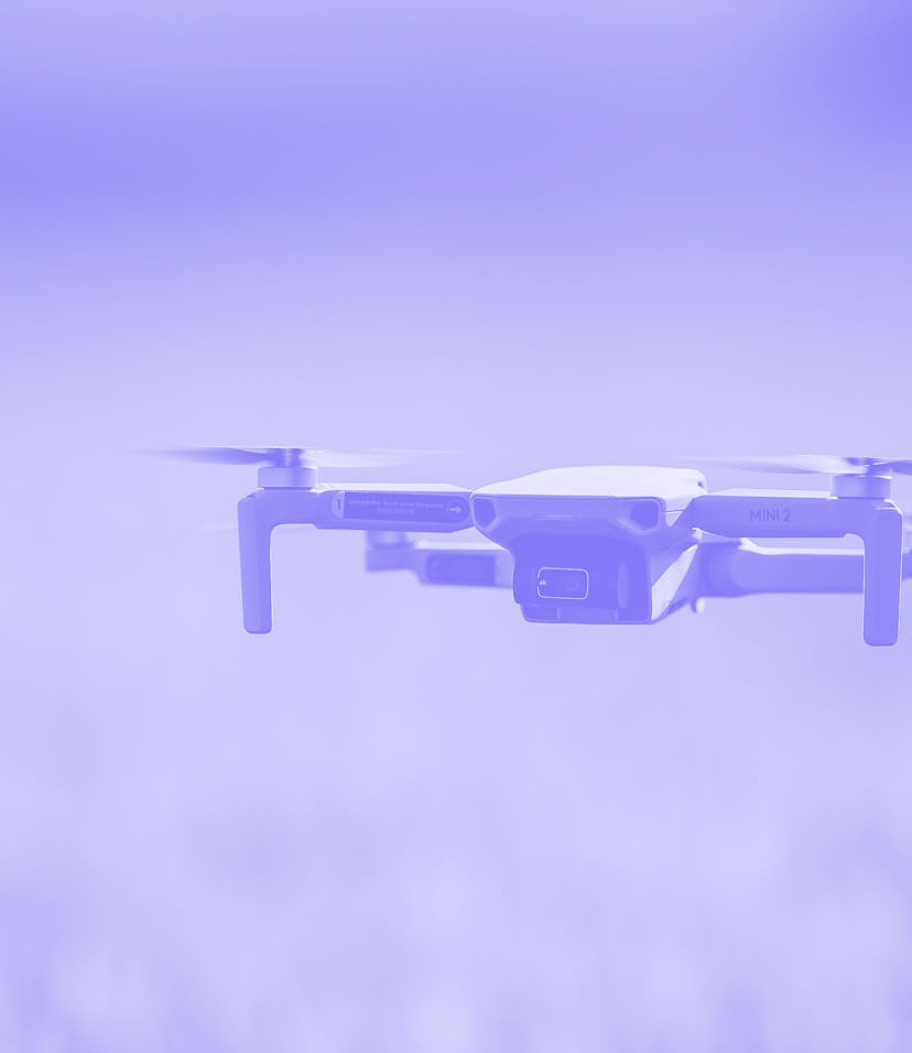Mavic mini 2 flying over green background. "Mavic mini 2 was launched on November 2020 and is the su...