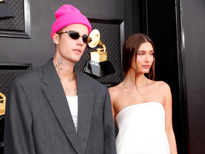 LAS VEGAS, NEVADA - APRIL 03: (L-R) Justin Bieber and Hailey Bieber attend the 64th Annual GRAMMY Aw...