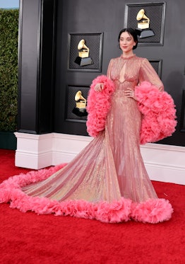 st. vincent wears pink ruffled dress on the 2022 Grammys red carpet