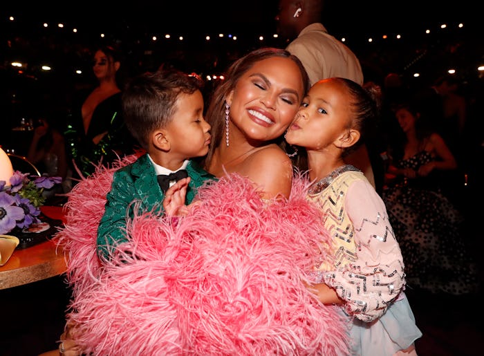 LAS VEGAS, NEVADA - APRIL 03: (L-R) Miles Stephens, Chrissy Teigen, and Luna Stephens attend the 64t...