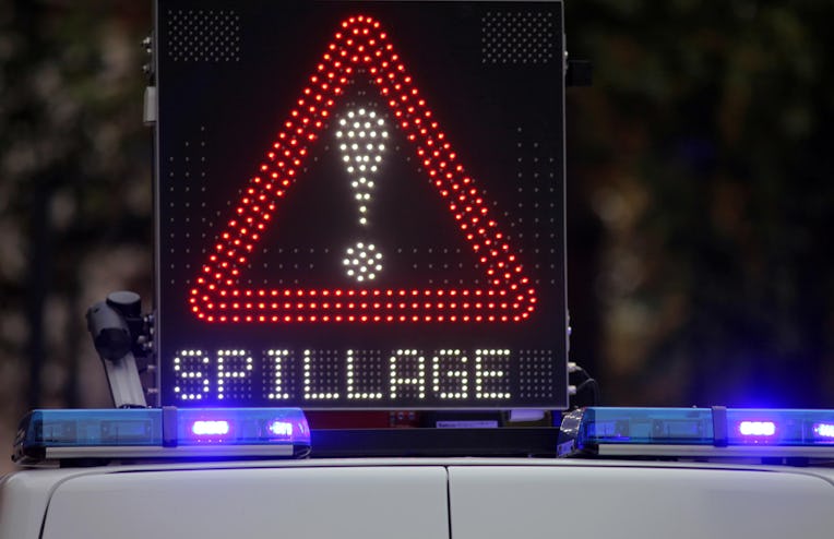 A spillage sign on top of a police van in central London where three people were taken hospital afte...