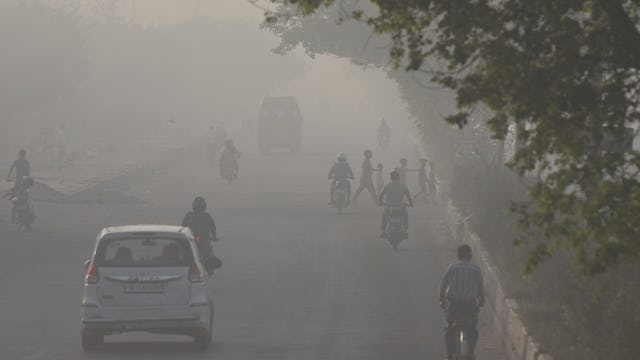 NEW DELHI, INDIA MARCH 29: Heavy smog seen in area surrounding Ghazipur landfill in morning after f...
