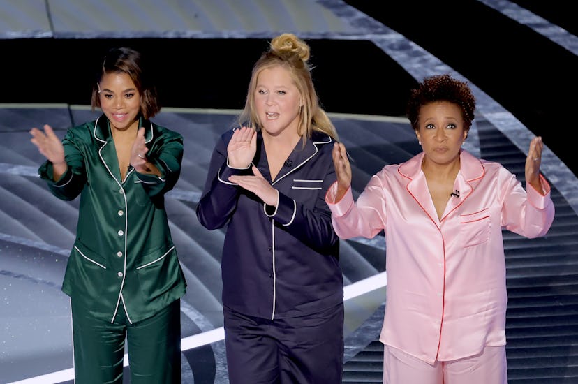 Co-hosts Regina Hall, Amy Schumer, and Wanda Sykes speak onstage during the 94th Annual Academy Awar...
