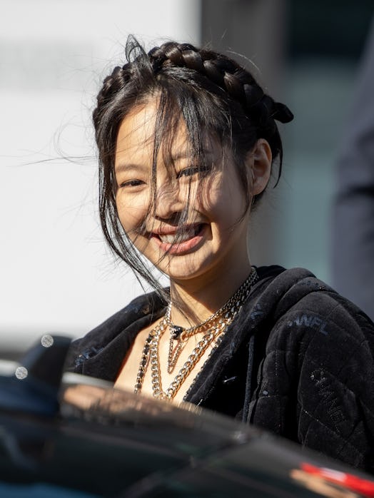 BLACKPINK's Jennie Kim wore a halo braid while attending the Chanel Womenswear Fall/Winter 2022/2023...