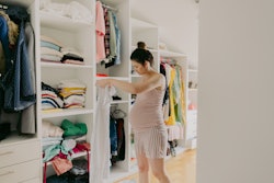 Experts explain the science behind nesting during pregnancy, including the biological urge to organi...