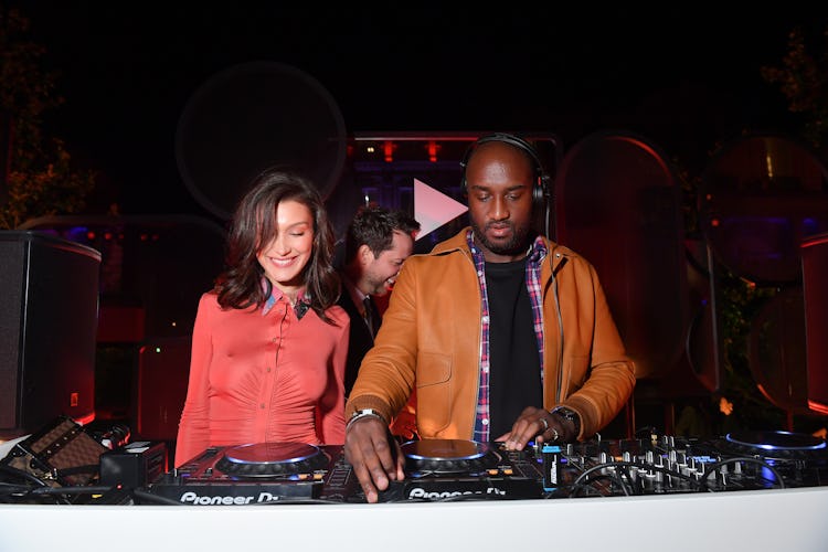 PARIS, FRANCE - SEPTEMBER 26:  (L-R) Bella Hadid and Virgil Abloh attend the YouTube cocktail party ...