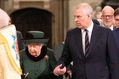 Britain's Queen Elizabeth II (L) and Britain's Prince Andrew, Duke of York, arrive to attend a Servi...
