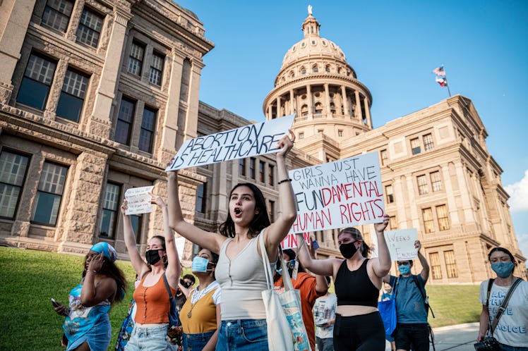 Pro-choice protesters march outside the Texas State Capitol on Wednesday, Sept. 1, 2021 in Austin, T...
