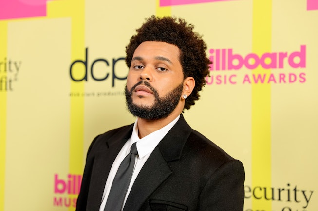 LOS ANGELES, CALIFORNIA - MAY 23: The Weeknd poses backstage for the 2021 Billboard Music Awards, br...