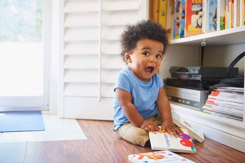 baby boy with books