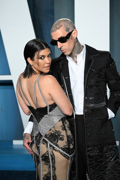 BEVERLY HILLS, CALIFORNIA - MARCH 27: Kourtney Kardashian and Travis Barker attend 2022 Vanity Fair ...