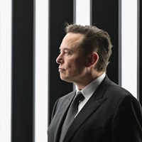 Tesla CEO Elon Musk is pictured as he attends the start of the production at Tesla's "Gigafactory" o...