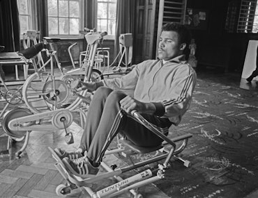 British boxer John Conteh using a Tunturi rowing machine, UK, 8th May 1973. He is in training for hi...