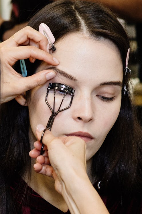 MILAN, ITALY - JANUARY 13:  A model is seen backstage ahead of the Neil Barrett show during Milan Me...