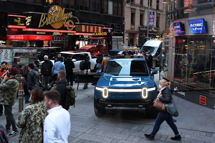 A Rivian electric truck is displayed in front of the Nasdaq MarketSite building in Times Square in N...