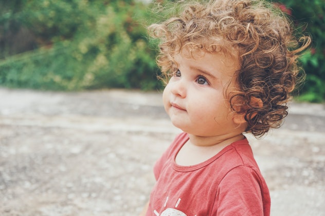 Curly haired toddler boy