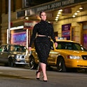 Ashley Graham walks along 46th Street during the Michael Kors Fashion Show in Times Square in 2021. ...