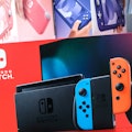 This picture taken on May 9, 2022, shows a box of Nintendo Switch video game console is displayed at...