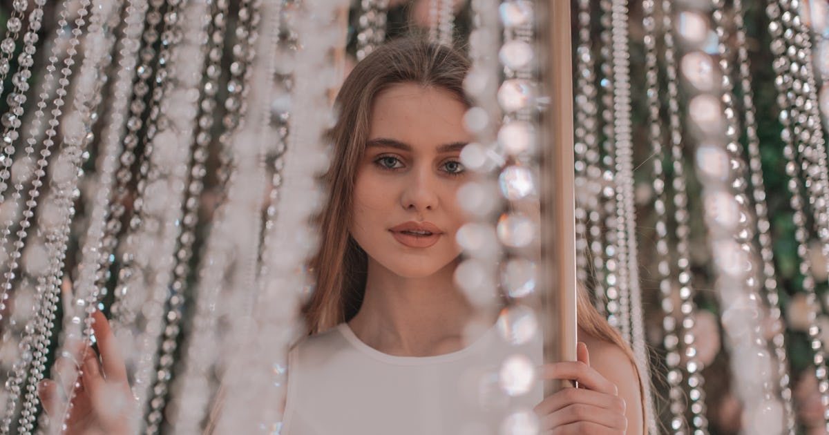 Gen Z Wedding Trends For 2022 Include Black Dresses, According To