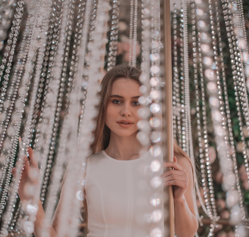 Gen Z wedding trends for 2022, according to Pinterest, include pearl decor and dresses.