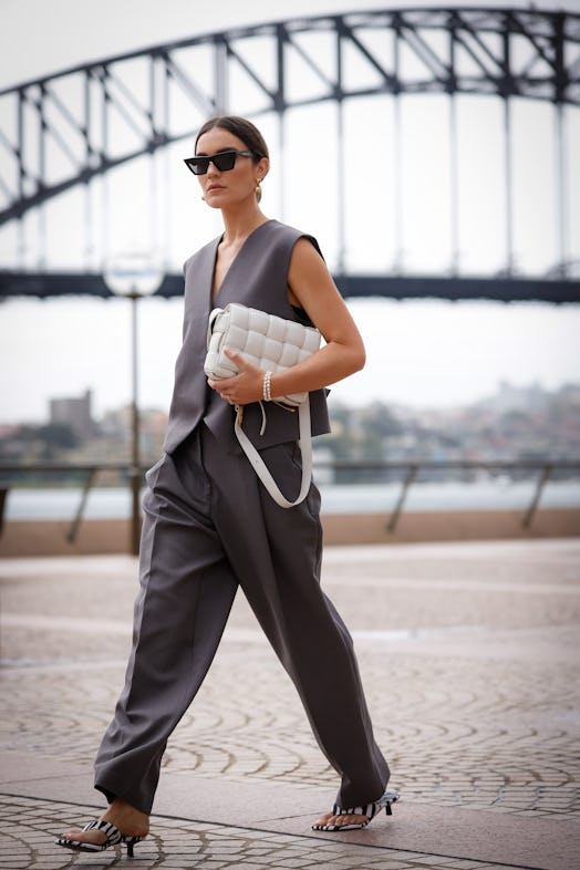 Holly Titheridge Bottega Veneta white clutch at Afterpay Australian Fashion Week 2022 
