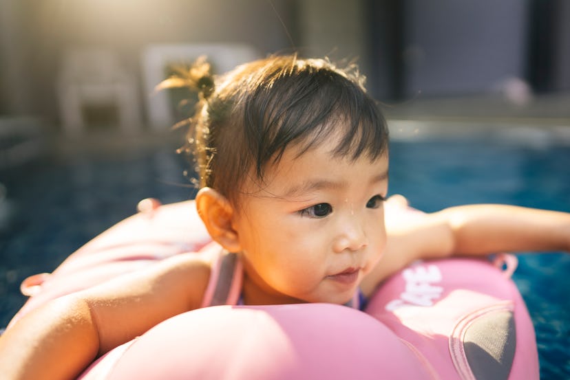 little girl in pool, instagram captions for pictures of your kid's first time swimming