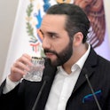 Salvadoran President Nayib Bukele drinks during a joint press conference offered with his Mexican co...
