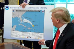 WASHINGTON, DC - SEPTEMBER 04: U.S. President Donald Trump (R) references a map held by acting Homel...