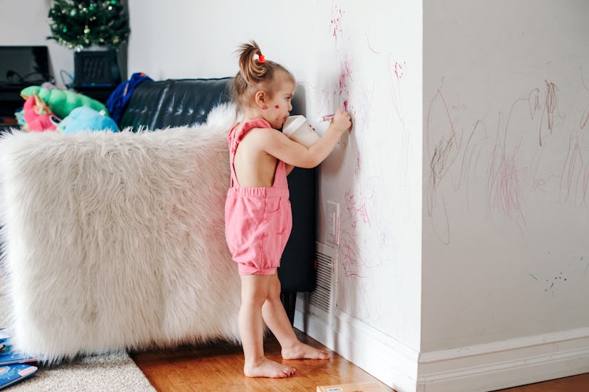 toddler girl drawing on wall, instagram captions for kids making messes