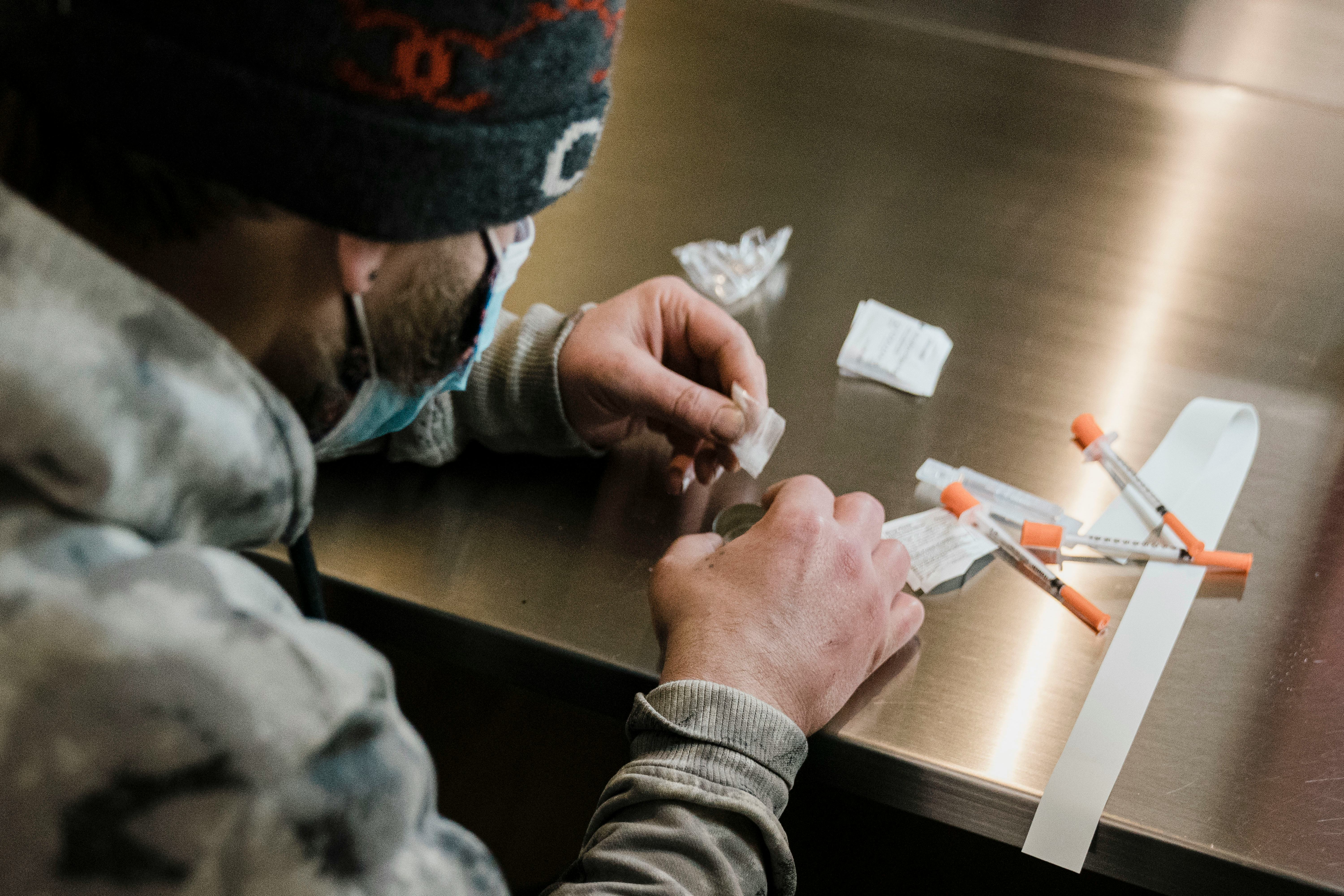 NEW YORK, NY - JANUARY 24: A man utilizes the narcotic consumption booths at a safe injection site a...