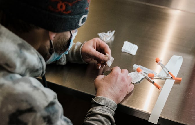 NEW YORK, NY - JANUARY 24: A man utilizes the narcotic consumption booths at a safe injection site a...