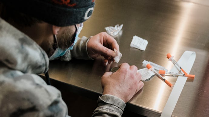 NEW YORK, NY - JANUARY 24: A man utilizes the narcotic consumption booths at a safe injection site a...