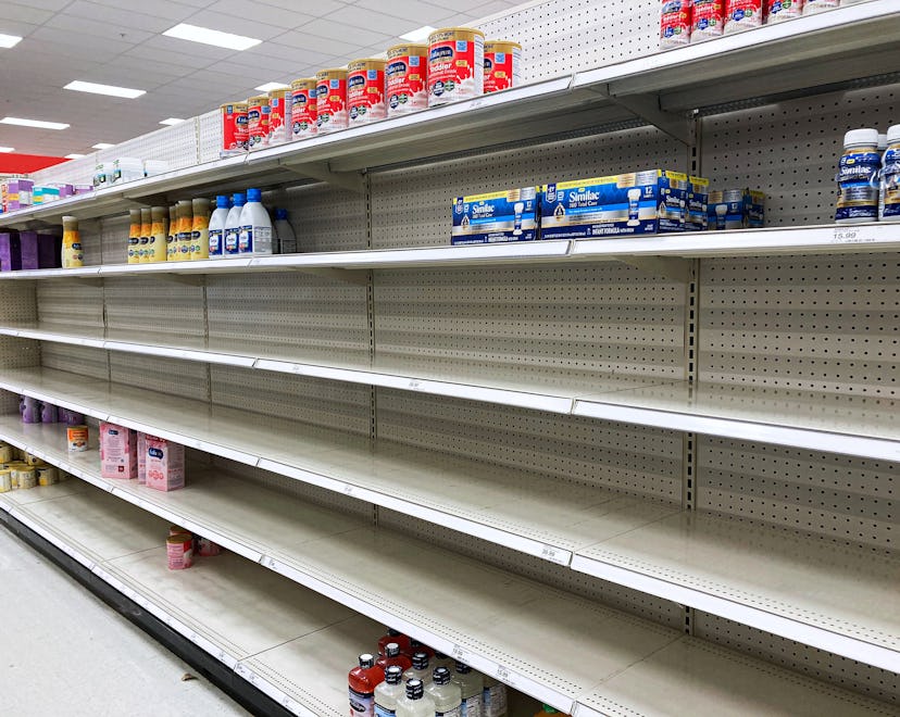 A nearly empty baby formula display shelf is seen at a Target store in Orlando.