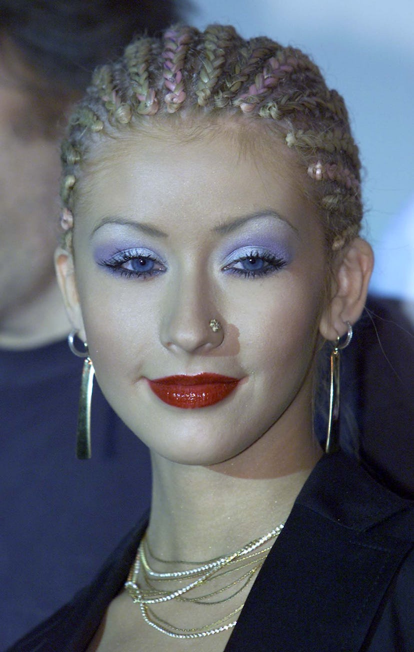 Christina Aguilera sported icy blue icy shadow and red lipstick at the Radio and Records Convention ...